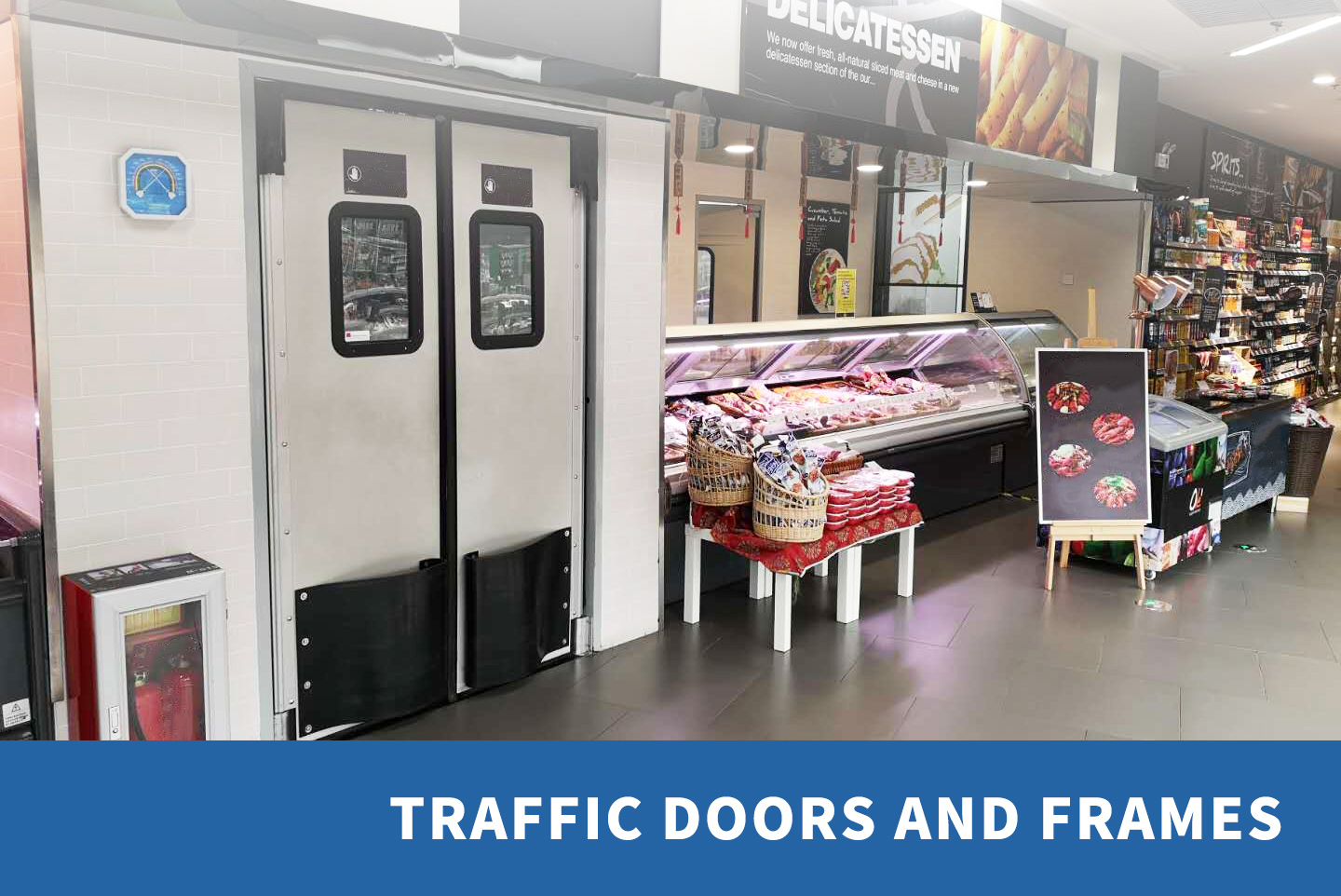 Traffic doors and frames: double traffic doors with windows at a supermarket deli Traffic doors and frames: double traffic doors with windows at a supermarket deli